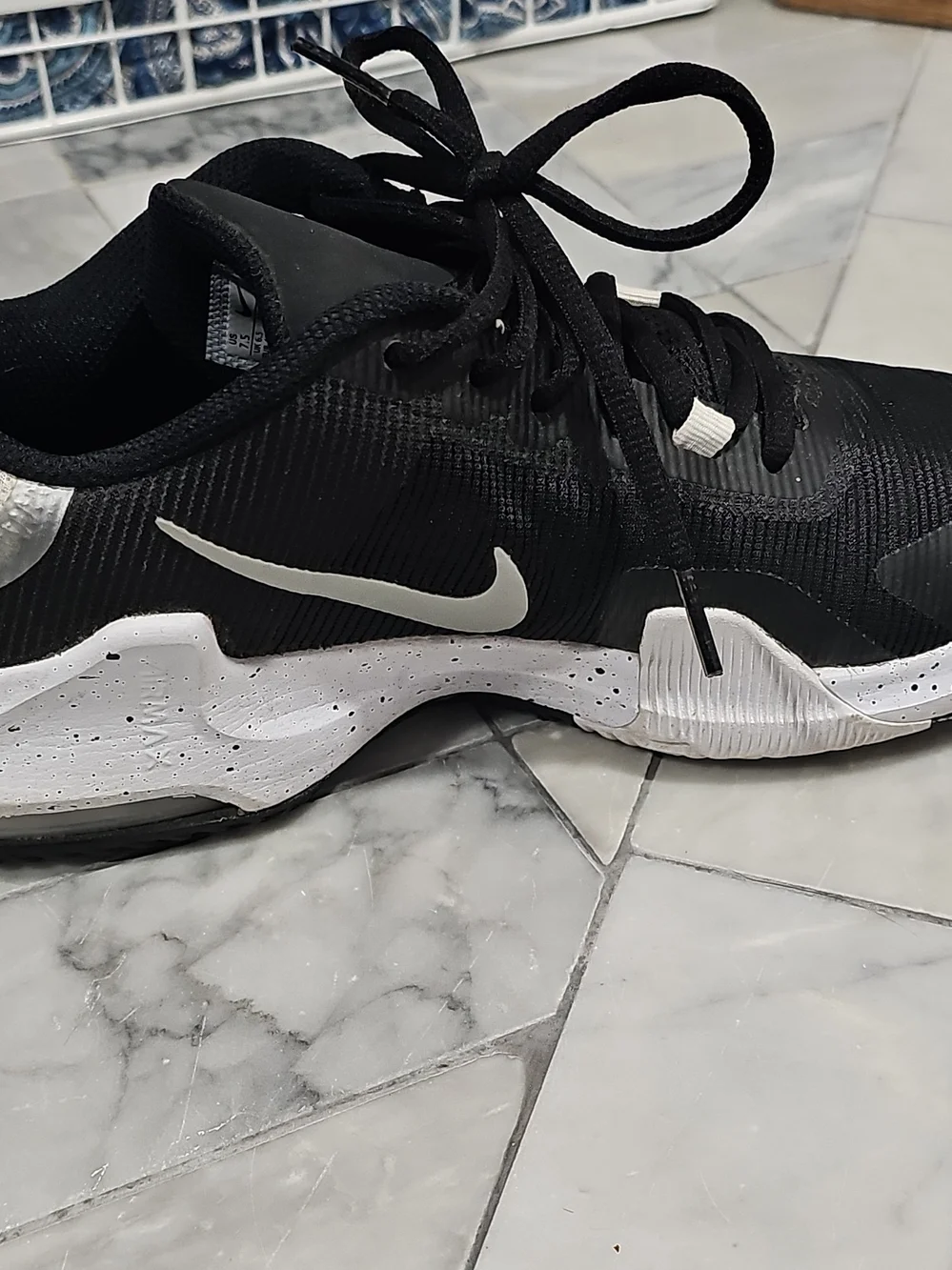 Nike AirMax Impact 4 Men’s Black and White Low-Top Athletic Sneakers